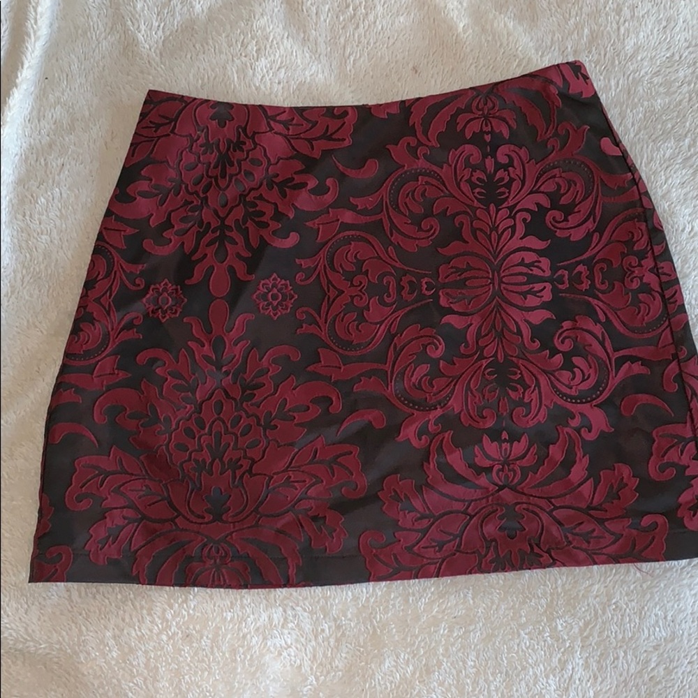 Gorgeous red embroidered black mini skirt